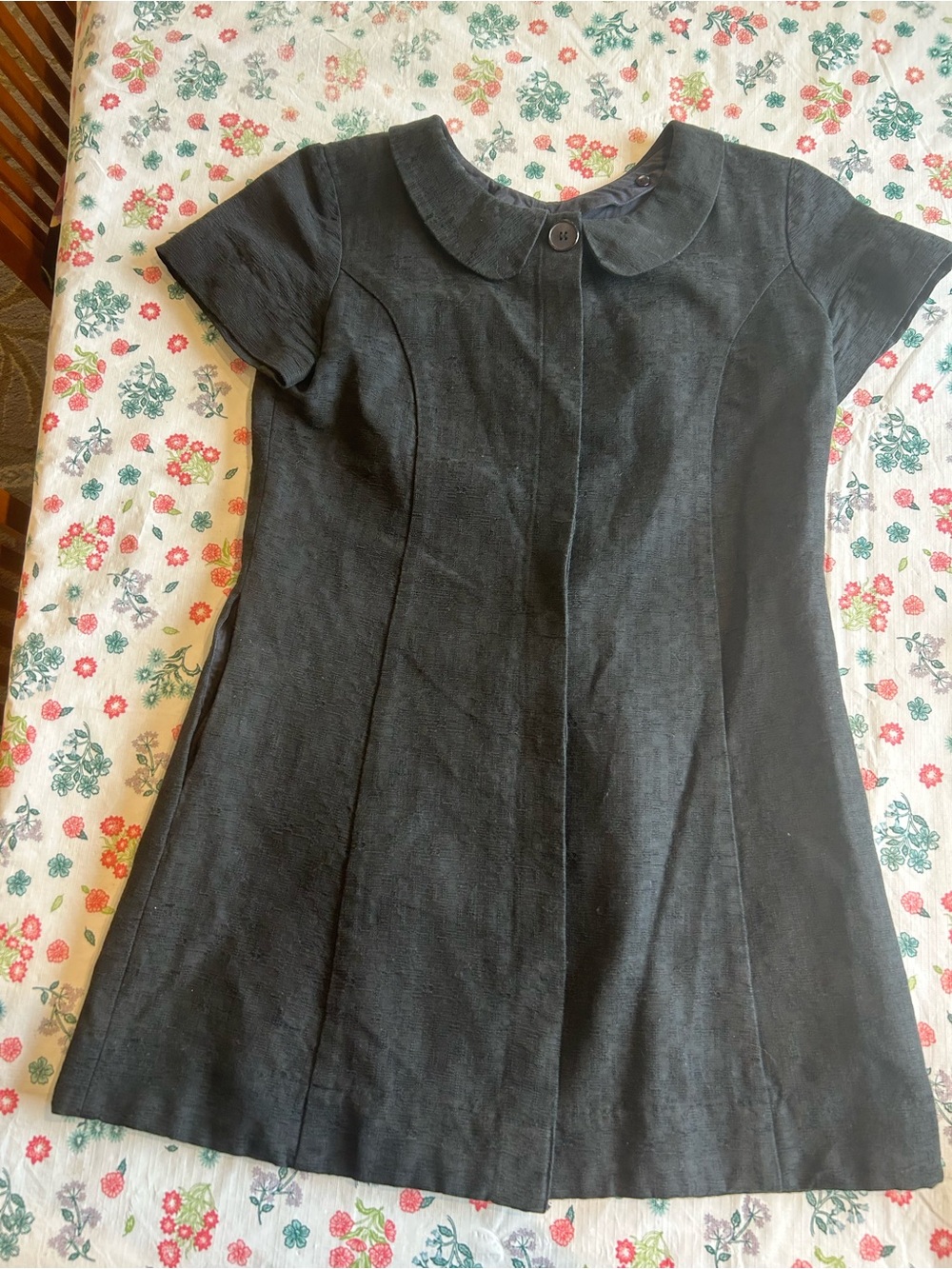 Mini or stylish indoor black jacket. Quality Piece with Rounded Peter Pan Collar
